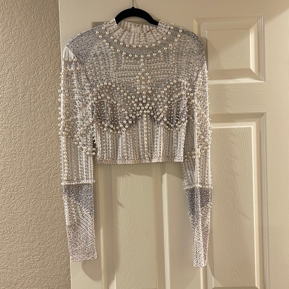 Embellished top with pearls and stones